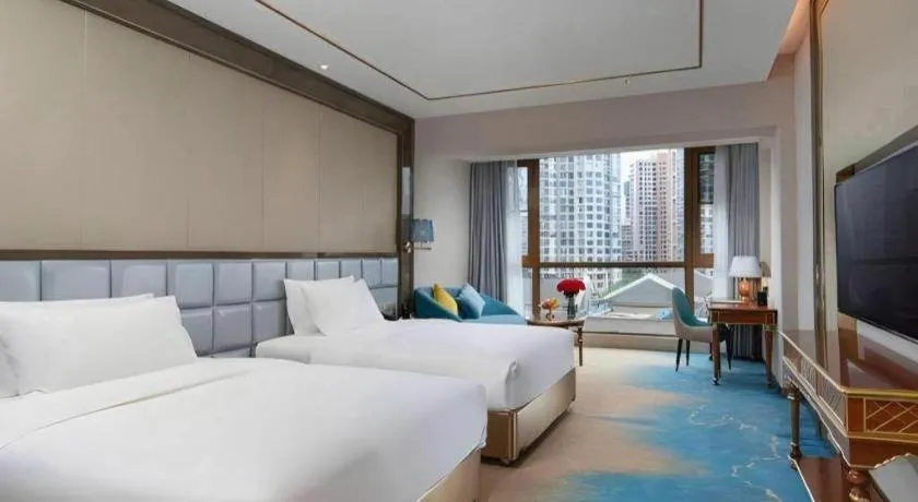 Bed in Vienna Hotel Yunnan Maitreya Huquan