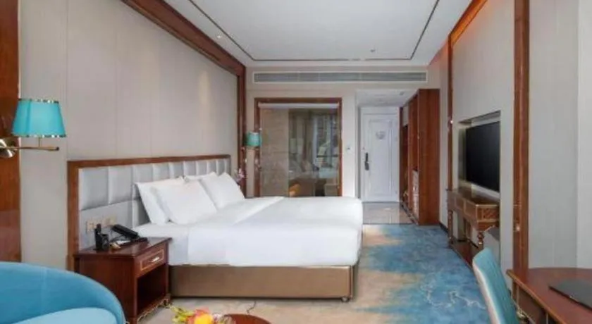 Bed in Vienna Hotel Yunnan Maitreya Huquan