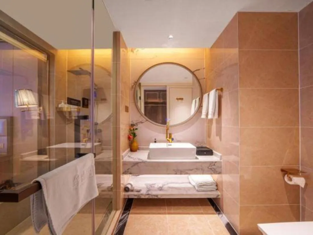 Bed in Vienna Hotel Yunnan Maitreya Huquan