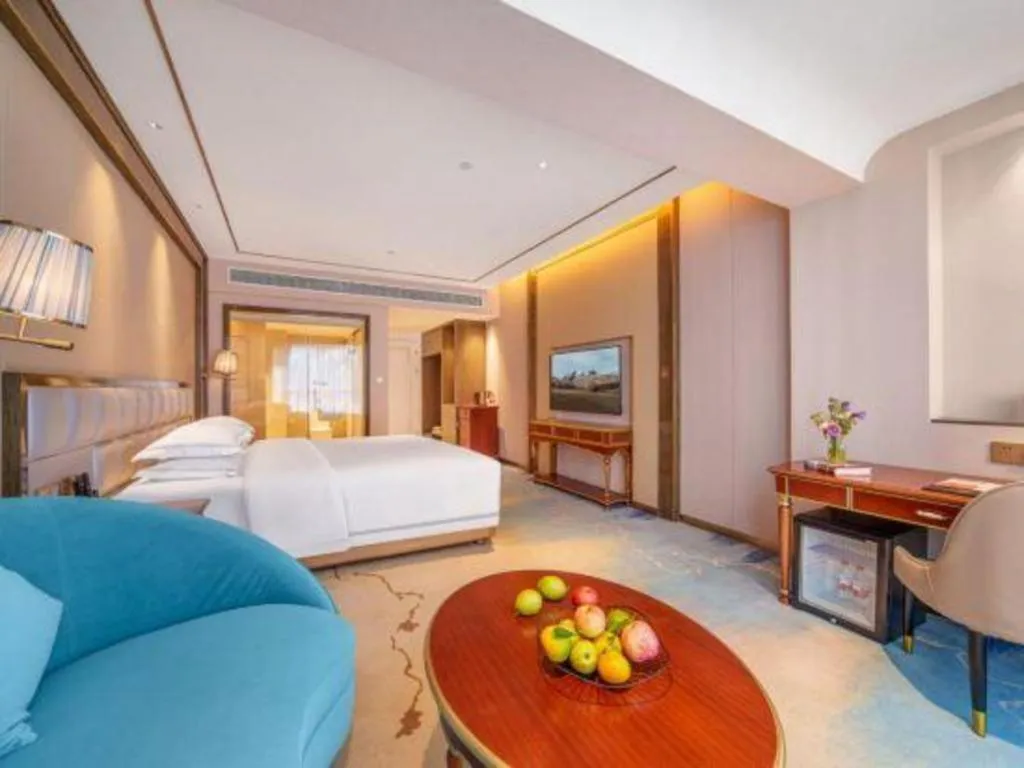 Bed in Vienna Hotel Yunnan Maitreya Huquan