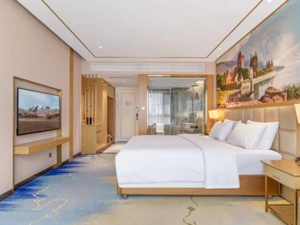 Bed in Vienna Hotel Yunnan Maitreya Huquan