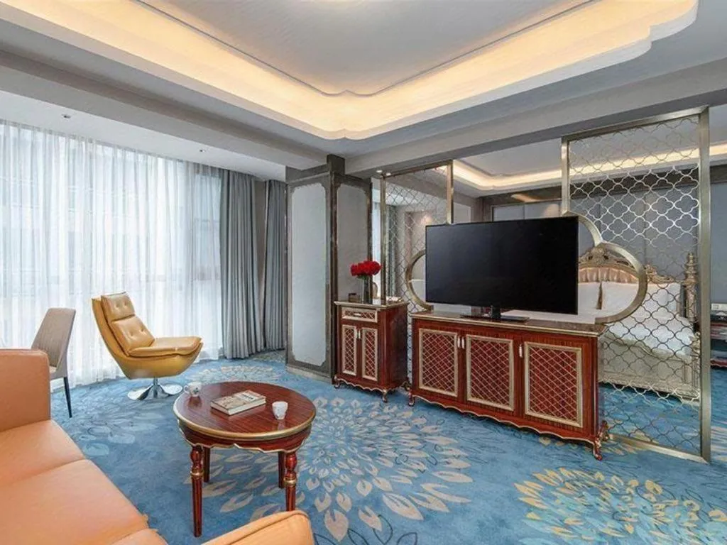 Bed in Vienna Hotel Yunnan Maitreya Huquan