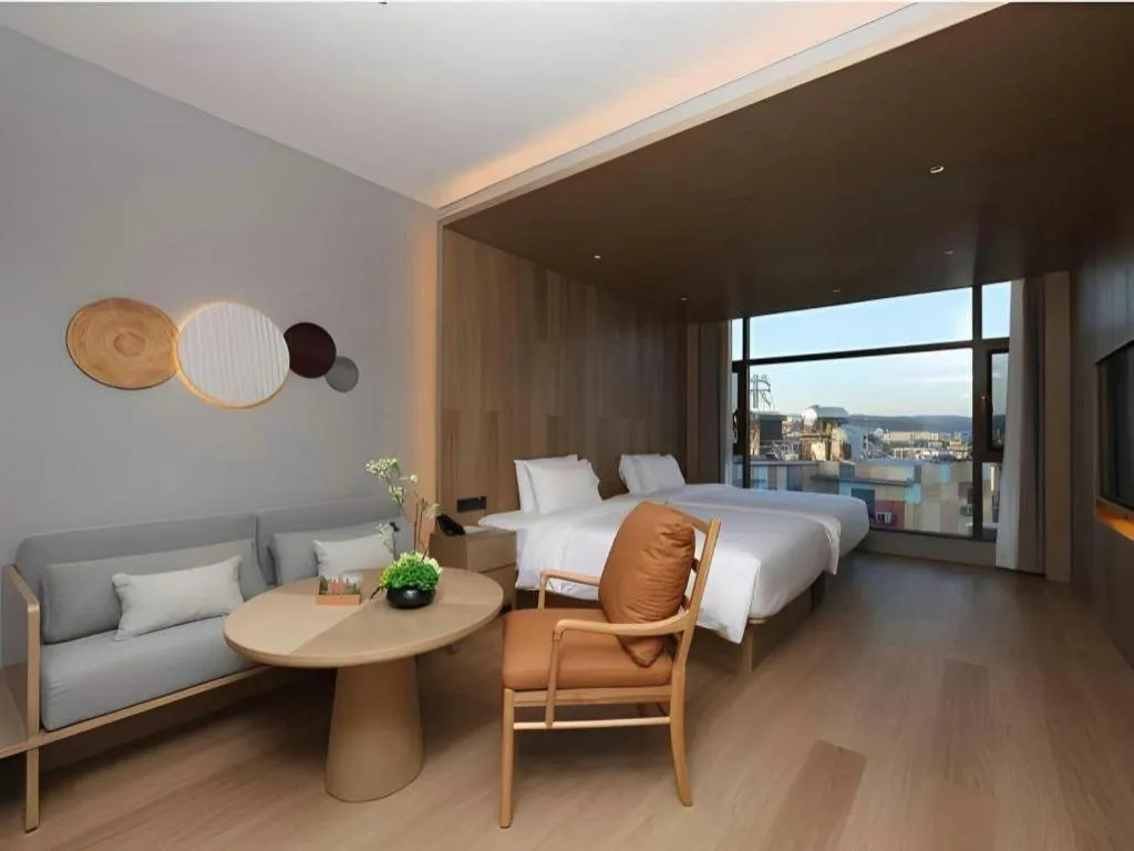 Bed in Vienna Hotel Yunnan Maitreya Huquan