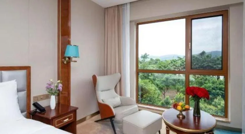 Bed in Vienna Hotel Yunnan Maitreya Huquan