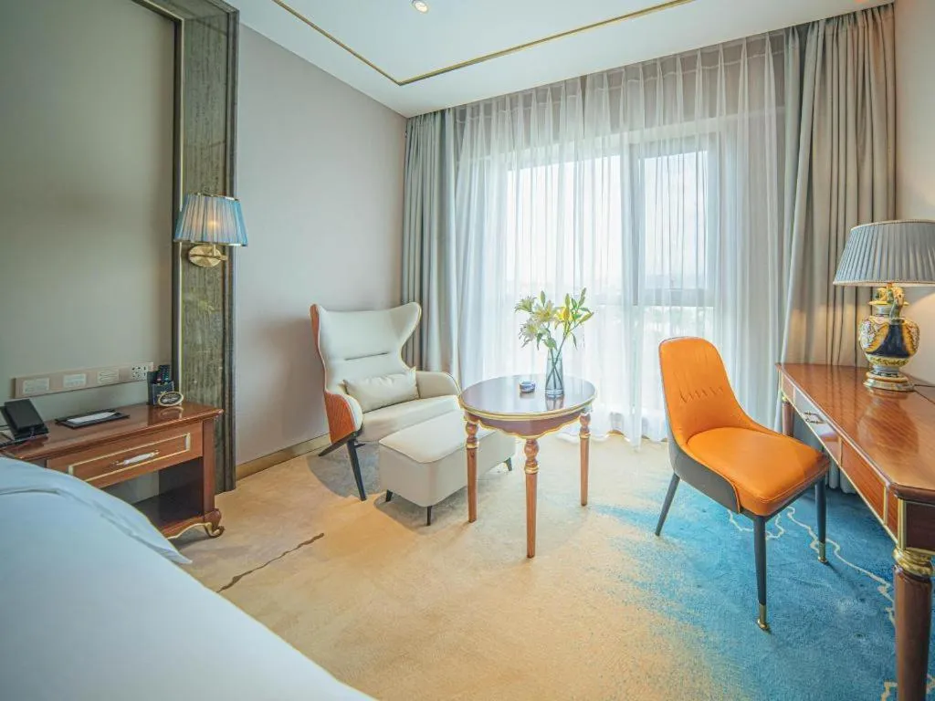 Bed in Vienna Hotel Yunnan Maitreya Huquan