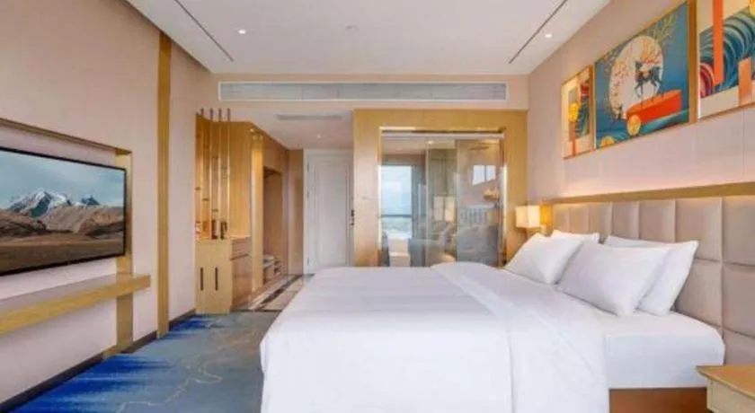 Bed in Vienna Hotel Yunnan Maitreya Huquan