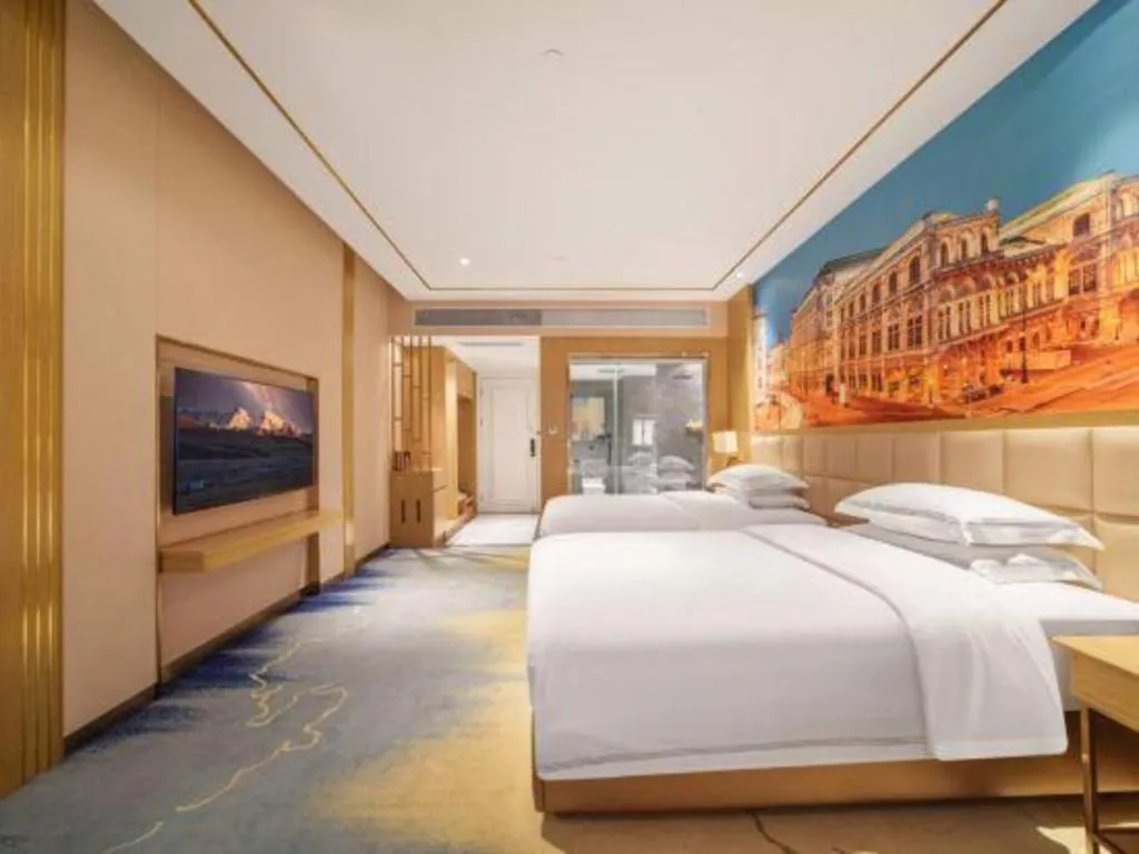 Bed in Vienna Hotel Yunnan Maitreya Huquan