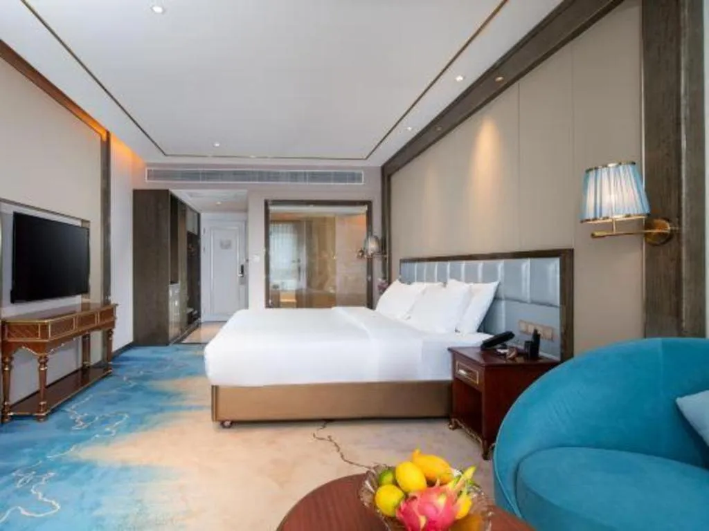 Bed in Vienna Hotel Yunnan Maitreya Huquan