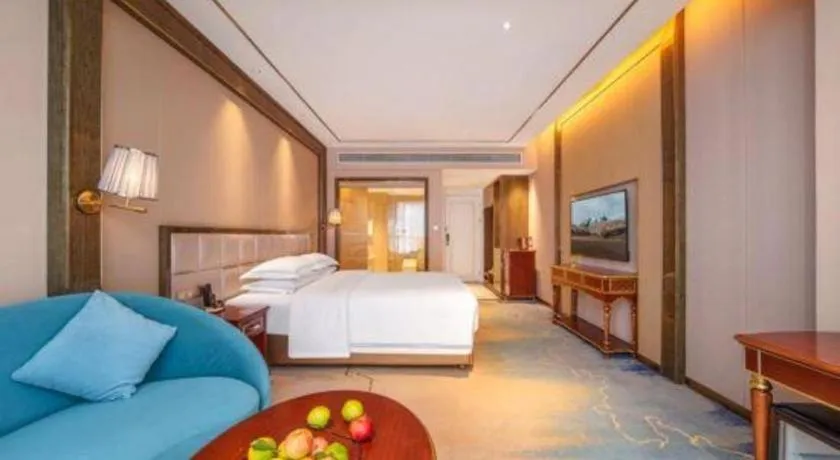 Bed in Vienna Hotel Yunnan Maitreya Huquan