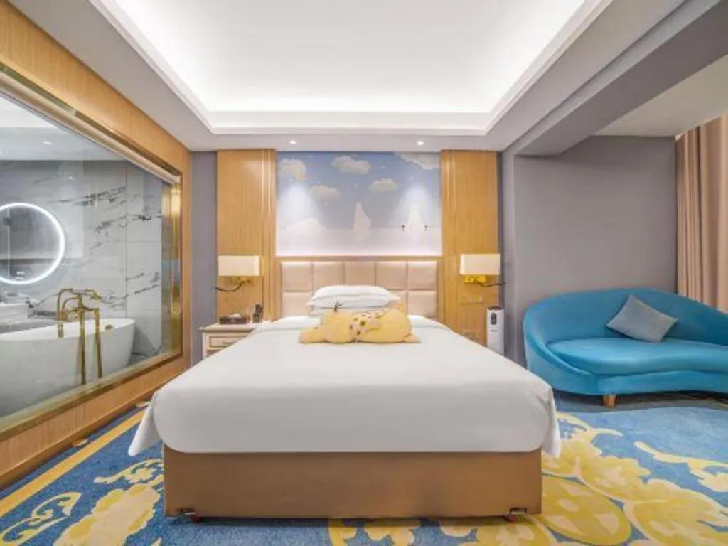 Bed in Vienna Hotel Yunnan Maitreya Huquan