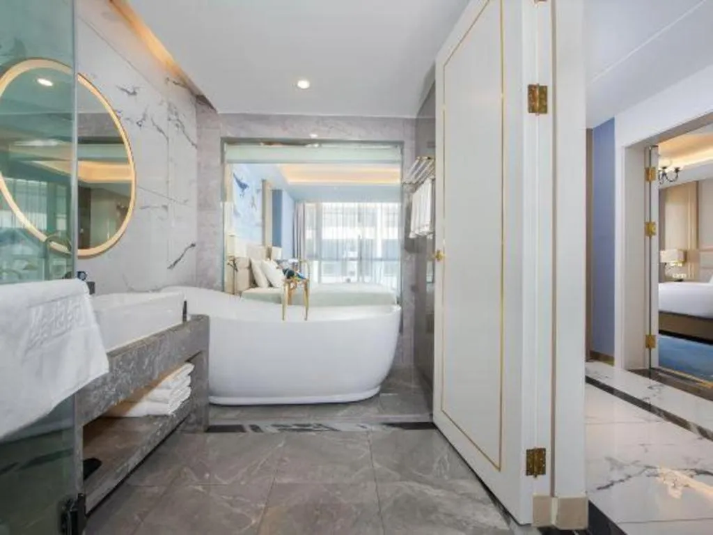 Bed in Vienna Hotel Yunnan Maitreya Huquan