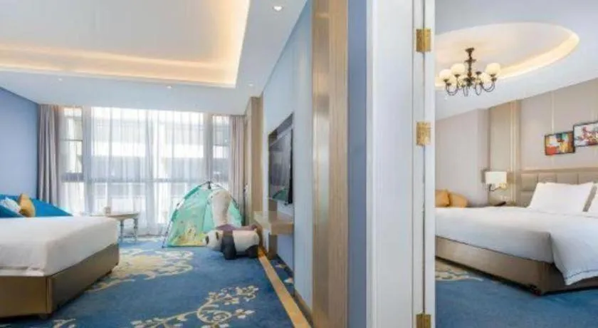 Bed in Vienna Hotel Yunnan Maitreya Huquan