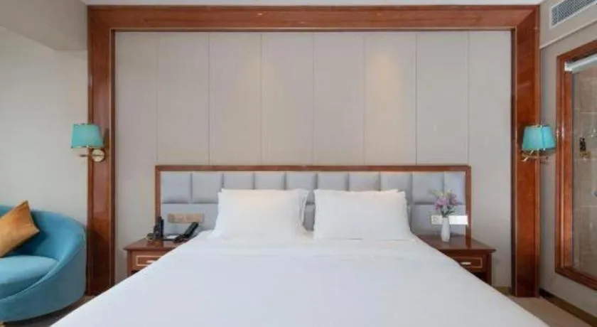 Bed in Vienna Hotel Yunnan Maitreya Huquan