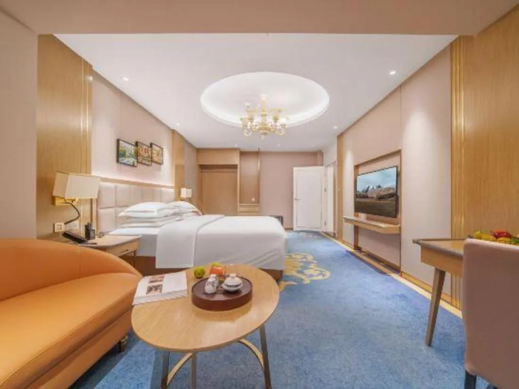 Bed in Vienna Hotel Yunnan Maitreya Huquan