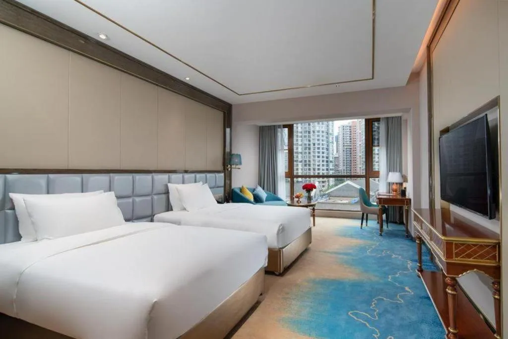 Bed in Vienna Hotel Yunnan Maitreya Huquan