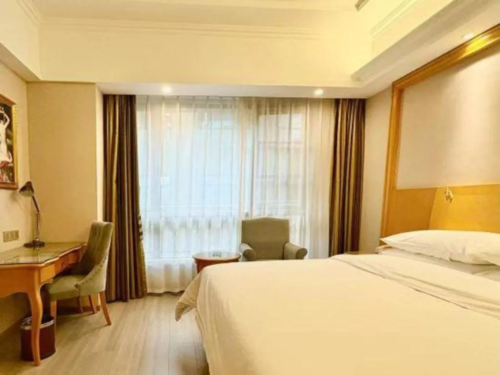 Bed in Vienna Hotel Anhui Xuancheng High-Speed Railway Station