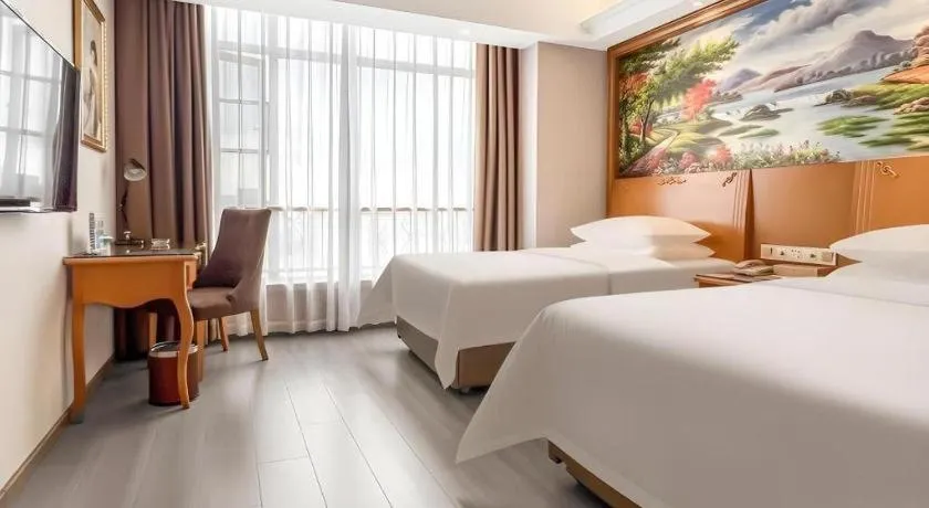 Bed in Vienna Hotel Anhui Xuancheng High-Speed Railway Station