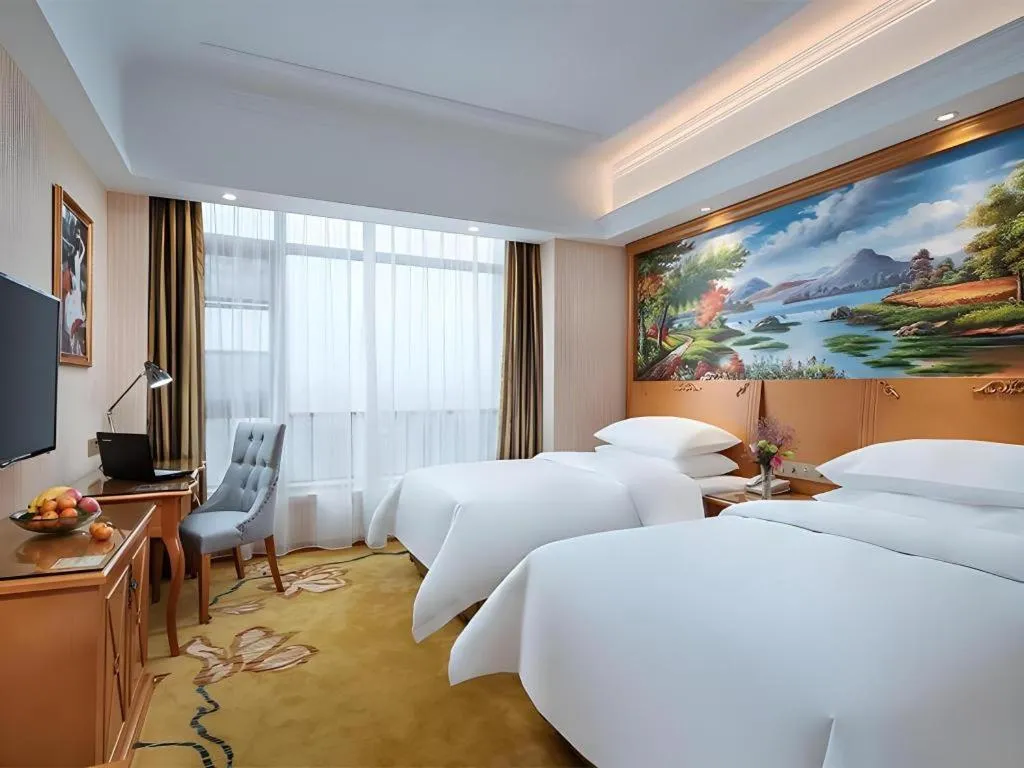 Bed in Vienna Hotel Anhui Xuancheng High-Speed Railway Station