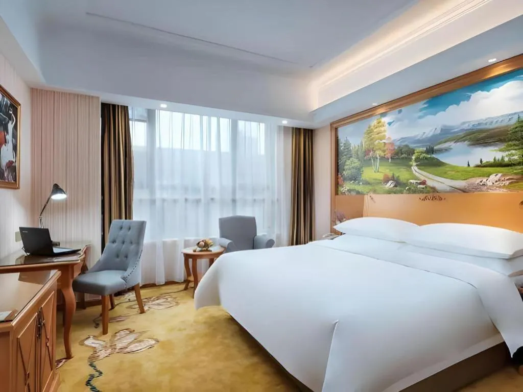 Bed in Vienna Hotel Anhui Xuancheng High-Speed Railway Station