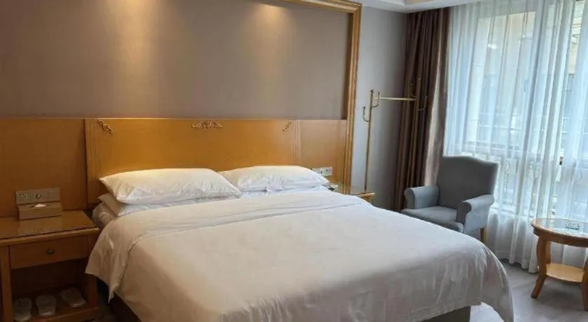 Bed in Vienna Hotel Anhui Xuancheng High-Speed Railway Station