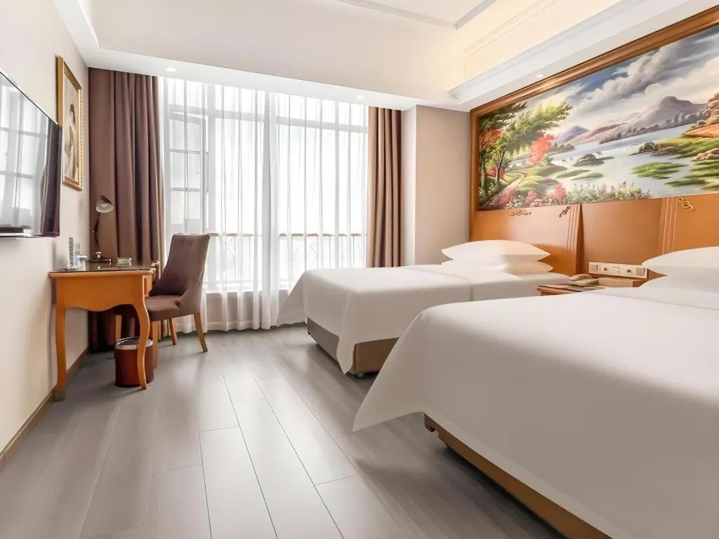 Bed in Vienna Hotel Anhui Xuancheng High-Speed Railway Station