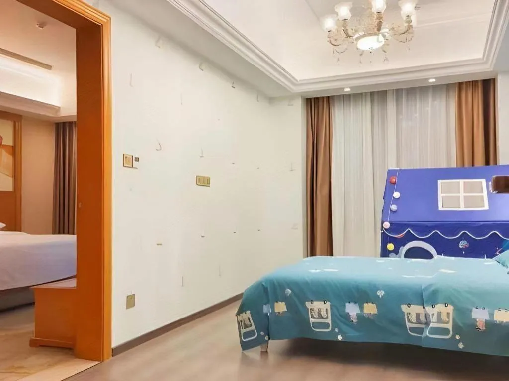 Bed in Vienna Hotel Anhui Xuancheng High-Speed Railway Station