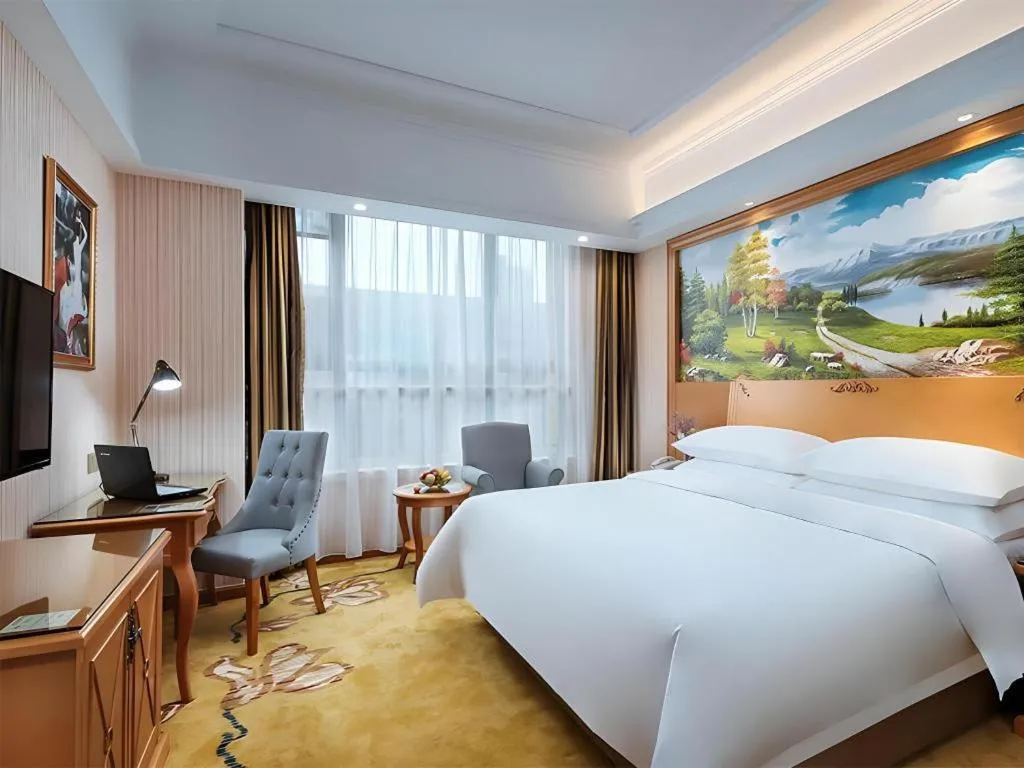 Bed in Vienna Hotel Anhui Xuancheng High-Speed Railway Station