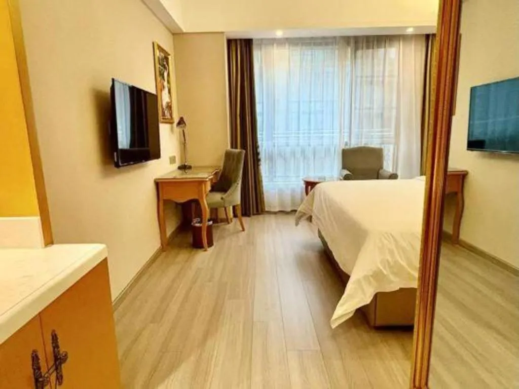 Bed in Vienna Hotel Anhui Xuancheng High-Speed Railway Station