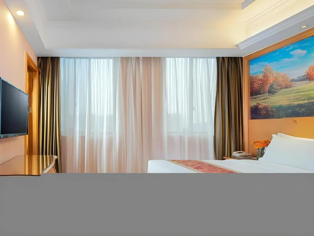 Bed in Vienna Hotel Hubei Macheng Cultural Town