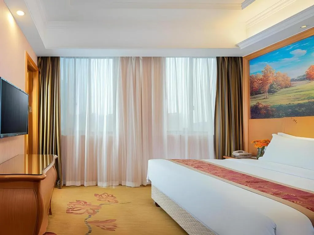 Bed in Vienna Hotel Hubei Macheng Cultural Town