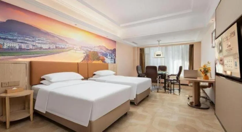 Bed in Vienna Hotel Hubei Macheng Cultural Town