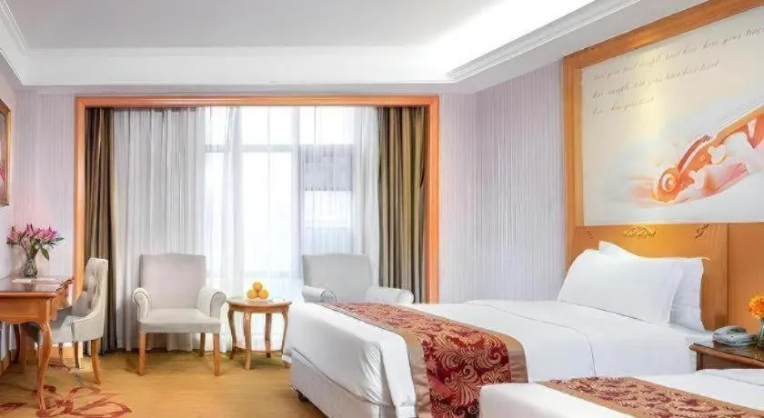 Bed in Vienna Hotel Hubei Macheng Cultural Town