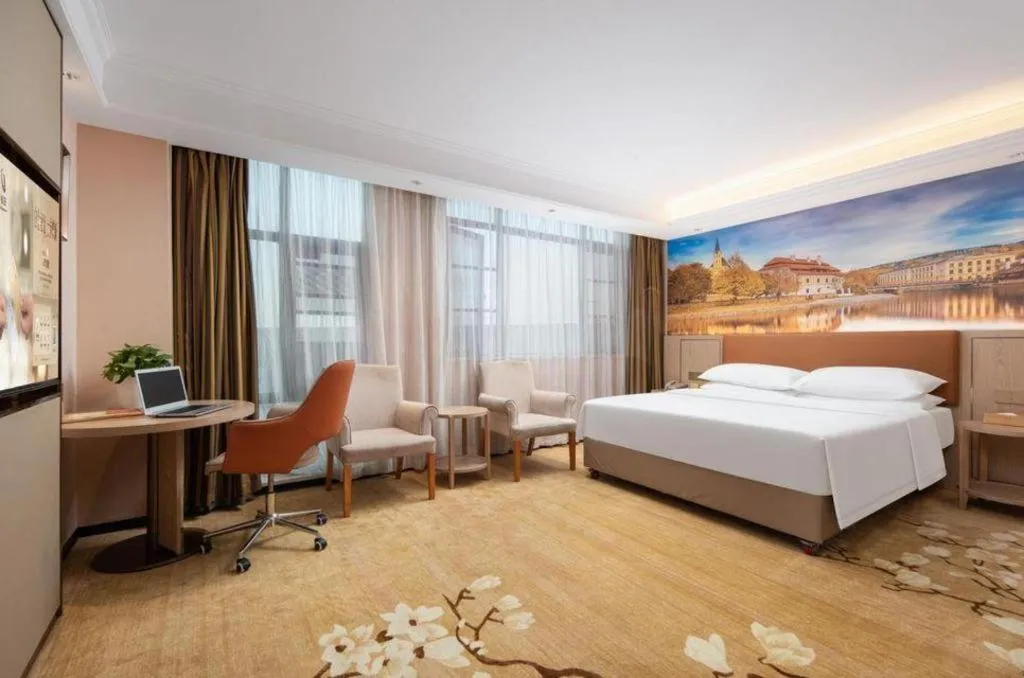 Bed in Vienna Hotel Hubei Macheng Cultural Town