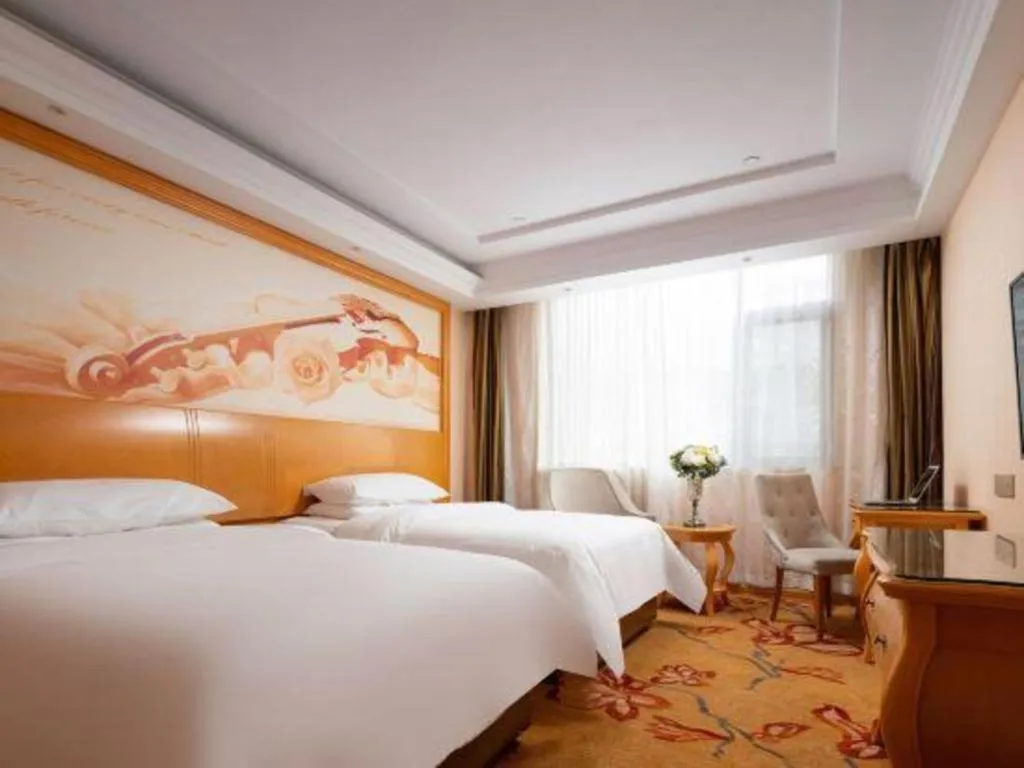 Bed in Vienna Hotel Tianjin 5th Avenue Youyi Road Cultural Center Metro Station