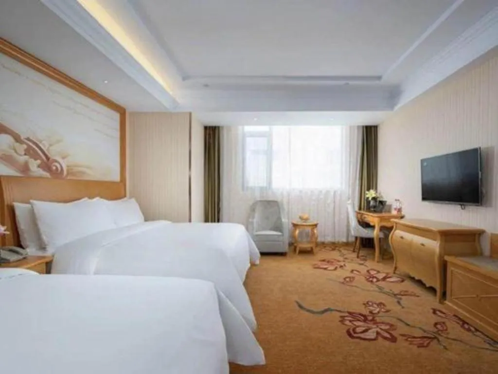 Bed in Vienna Hotel Tianjin 5th Avenue Youyi Road Cultural Center Metro Station