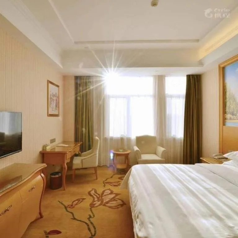 Bed in Vienna Hotel Tianjin 5th Avenue Youyi Road Cultural Center Metro Station