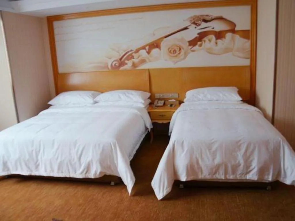 Bed in Vienna Hotel Tianjin 5th Avenue Youyi Road Cultural Center Metro Station