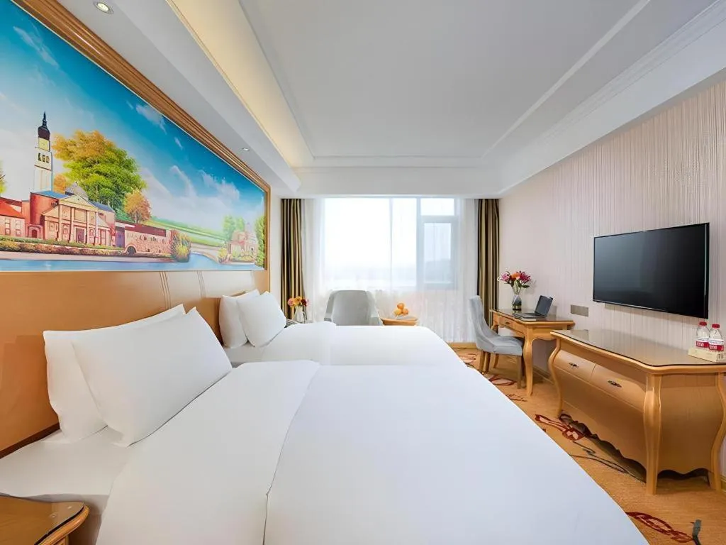 Bed in Vienna Hotel Tianjin 5th Avenue Youyi Road Cultural Center Metro Station