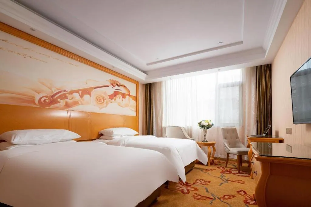 Bed in Vienna Hotel Tianjin 5th Avenue Youyi Road Cultural Center Metro Station