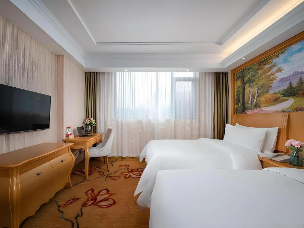 Bed in Vienna Hotel Tianjin 5th Avenue Youyi Road Cultural Center Metro Station