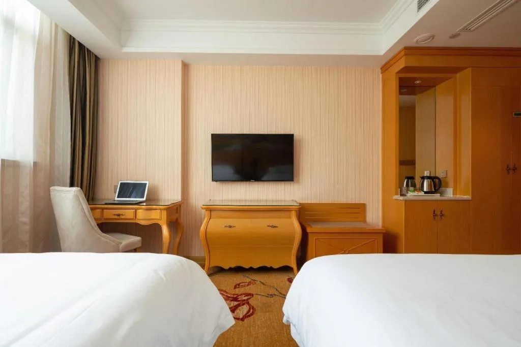 Bed in Vienna Hotel Tianjin 5th Avenue Youyi Road Cultural Center Metro Station