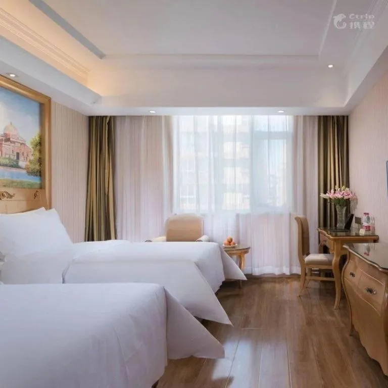 Bed in Vienna Hotel Tianjin 5th Avenue Youyi Road Cultural Center Metro Station