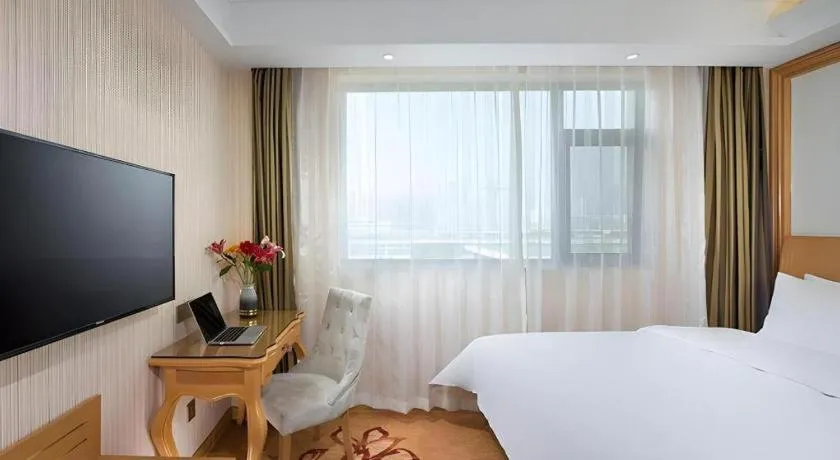 Bed in Vienna Hotel Tianjin 5th Avenue Youyi Road Cultural Center Metro Station