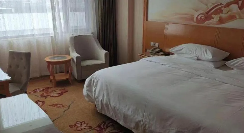 Bed in Vienna Hotel Tianjin 5th Avenue Youyi Road Cultural Center Metro Station