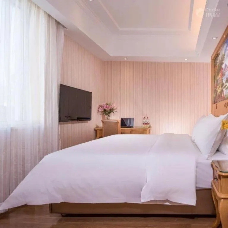 Bed in Vienna Hotel Tianjin 5th Avenue Youyi Road Cultural Center Metro Station