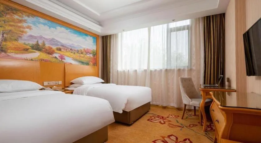 Bed in Vienna Hotel Tianjin 5th Avenue Youyi Road Cultural Center Metro Station
