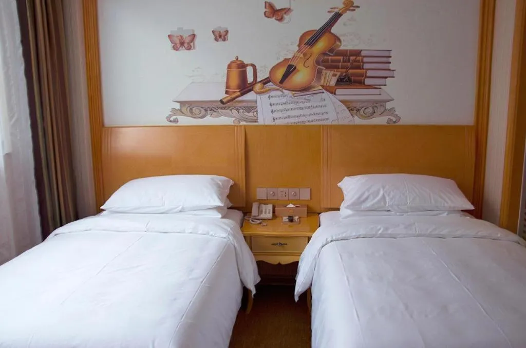 Bed in Vienna Hotel Tianjin 5th Avenue Youyi Road Cultural Center Metro Station