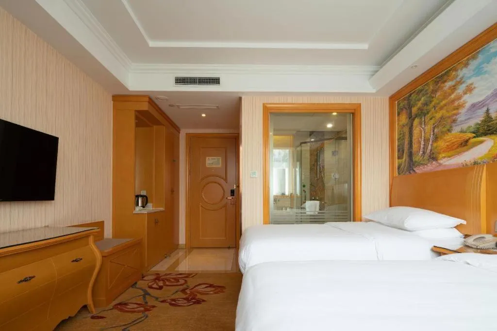 Bed in Vienna Hotel Tianjin 5th Avenue Youyi Road Cultural Center Metro Station