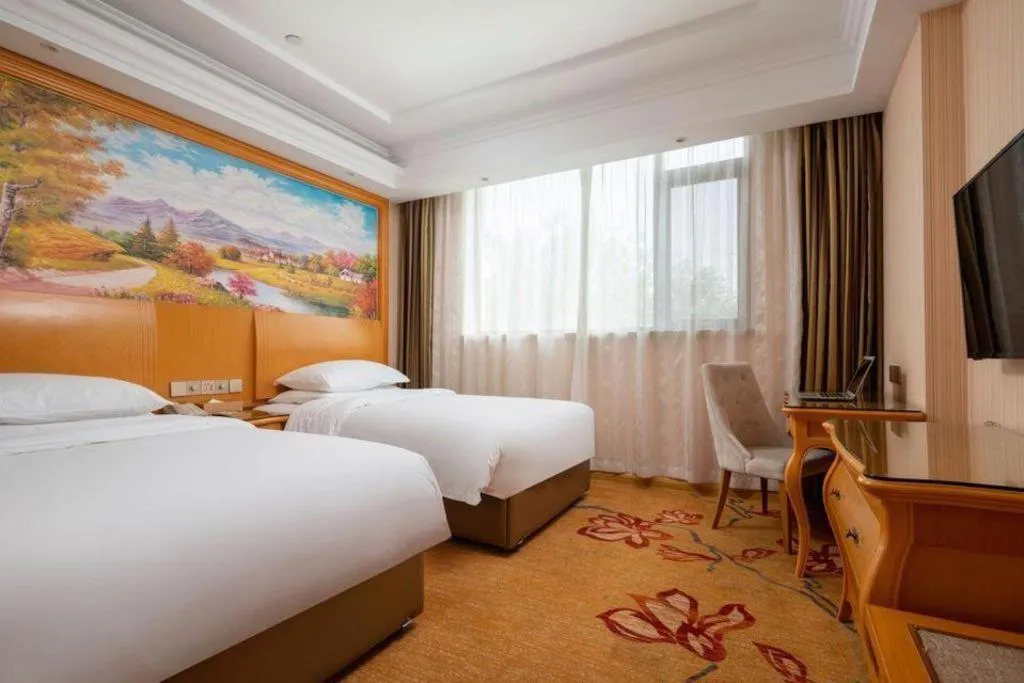 Bed in Vienna Hotel Tianjin 5th Avenue Youyi Road Cultural Center Metro Station