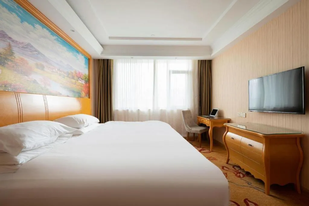 Bed in Vienna Hotel Tianjin 5th Avenue Youyi Road Cultural Center Metro Station